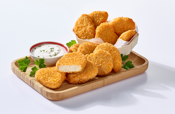 Nuggets de pollo Doux, con ketchup y un cucurucho de patatas fritas